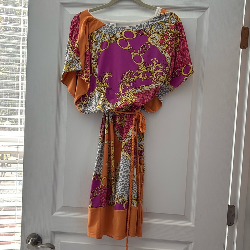Playful and colorful casual resort dress in bright fuschia and orange